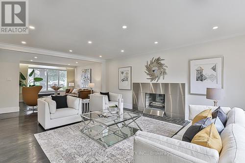 12 Banstock Dr, Toronto, ON - Indoor Photo Showing Living Room With Fireplace