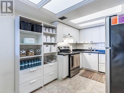 306 - 21 George Street, Aurora, ON - Indoor Photo Showing Kitchen With Double Sink