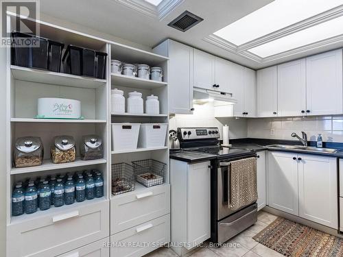 306 - 21 George Street, Aurora, ON - Indoor Photo Showing Kitchen With Double Sink