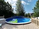 Piscine - 551 3E Avenue, Barraute, QC  - Outdoor With Above Ground Pool With Backyard 