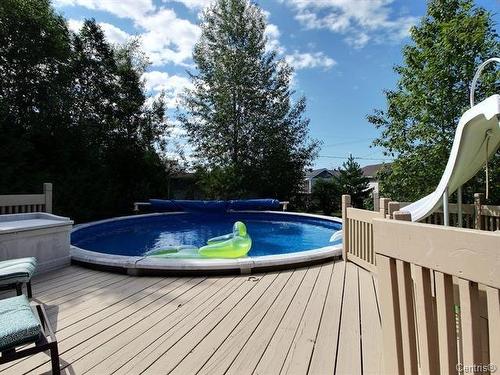 Piscine - 551 3E Avenue, Barraute, QC - Outdoor With Above Ground Pool With Backyard