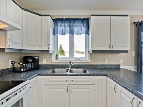 Cuisine - 122 Boul. Fortier, Saint-Isidore-De-Clifton, QC - Indoor Photo Showing Kitchen With Double Sink