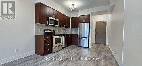 #910 -7165 Yonge St, Markham, ON - Indoor Photo Showing Kitchen With Stainless Steel Kitchen