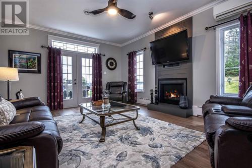 218 Conception Bay Highway, Holyrood, NL - Indoor Photo Showing Living Room With Fireplace