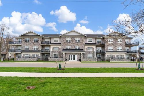 Welcome to HARRISON FLATS! Prestigious condo buildings in the heart of Caledonia. - 67 Haddington Street|Unit #304, Caledonia, ON - Outdoor With Balcony With Facade