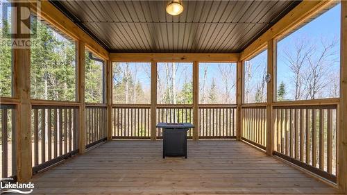 Screened in Muskoka room - off of kitchen - 1020 Ridgeline Drive, Lake Of Bays (Twp), ON -  With Deck Patio Veranda With Exterior