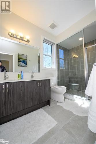 Primary/Master bathroom with double vanity sinks - 1020 Ridgeline Drive, Lake Of Bays (Twp), ON - Indoor Photo Showing Bathroom