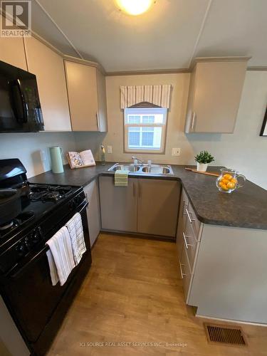 220 - 1501 Line 8 Road, Niagara-On-The-Lake, ON - Indoor Photo Showing Kitchen With Double Sink