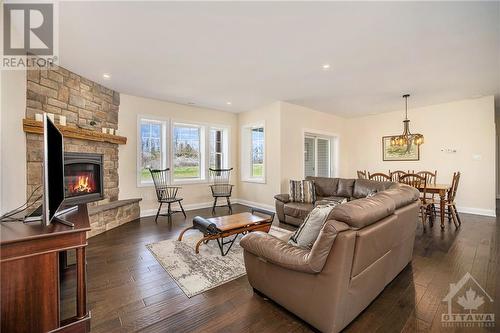530 Porter Road, Smiths Falls, ON - Indoor Photo Showing Living Room With Fireplace