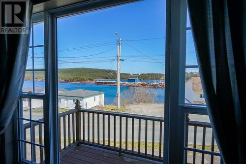 287 Main Road, Norman'S Cove-Long Cove, NL -  Photo Showing Other Room With Body Of Water
