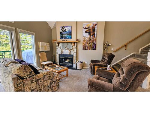 304 - 5155 Fairway Drive, Fairmont Hot Springs, BC - Indoor Photo Showing Living Room With Fireplace