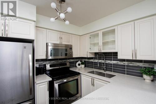 #403 -1000 King St W, Toronto, ON - Indoor Photo Showing Kitchen With Stainless Steel Kitchen With Double Sink