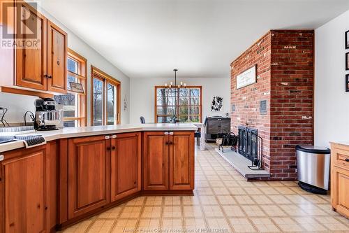 21088 Pier Road, Wheatley, ON - Indoor Photo Showing Kitchen With Fireplace