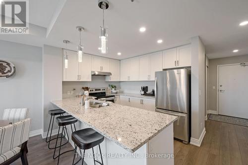 #415 -21 Brookhouse Dr, Clarington, ON - Indoor Photo Showing Kitchen With Double Sink With Upgraded Kitchen