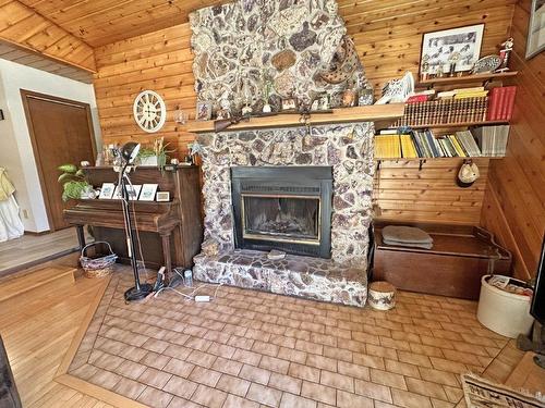 7309 Pursainen Road, Gorham, ON - Indoor Photo Showing Other Room With Fireplace