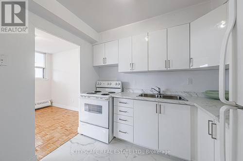 #812 -1442 Lawrence Ave W, Toronto, ON - Indoor Photo Showing Kitchen With Double Sink