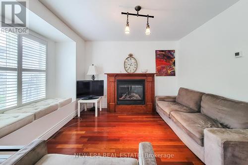 5147 Ravine Crescent, Burlington, ON - Indoor Photo Showing Living Room With Fireplace