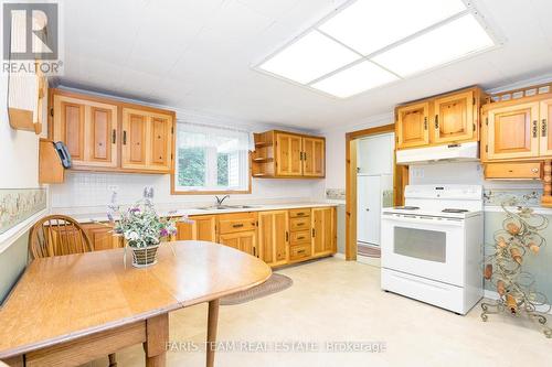 303 Ouida Street, Tay, ON - Indoor Photo Showing Kitchen With Double Sink