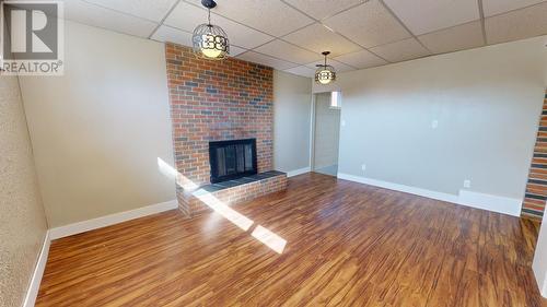 10516 104 Avenue, Fort St. John, BC - Indoor Photo Showing Living Room With Fireplace