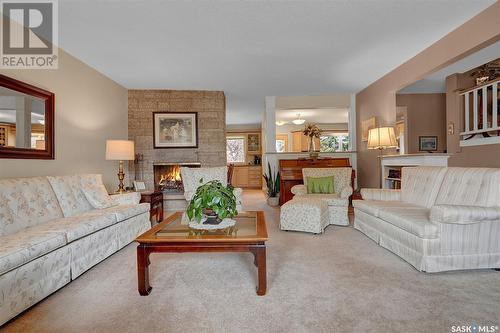10 Turnbull Place, Regina, SK - Indoor Photo Showing Living Room With Fireplace