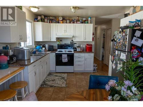 8616 87 Avenue, Fort St. John, BC - Indoor Photo Showing Kitchen With Double Sink