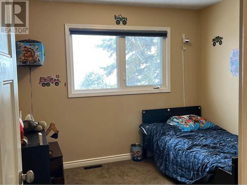 8716 91 Avenue, Fort St. John, BC - Indoor Photo Showing Bedroom