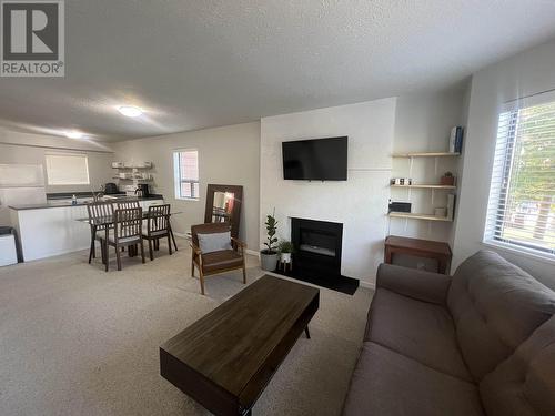 17 4832 Lazelle Avenue, Terrace, BC - Indoor Photo Showing Living Room With Fireplace