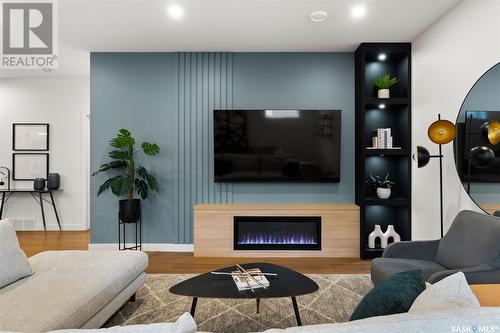 4143 Fieldstone Way, Regina, SK - Indoor Photo Showing Living Room With Fireplace