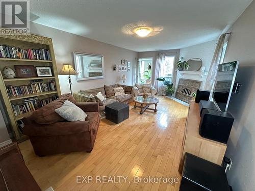28 Huntingwood Ave, Hamilton, ON - Indoor Photo Showing Living Room With Fireplace