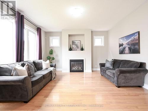 24 Bear Run Rd, Brampton, ON - Indoor Photo Showing Living Room With Fireplace