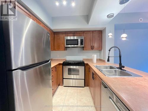 #1022 -3047 Finch Ave W, Toronto, ON - Indoor Photo Showing Kitchen With Double Sink