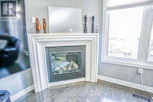 67 Lorenzo Circ, Brampton, ON - Indoor Photo Showing Other Room With Fireplace