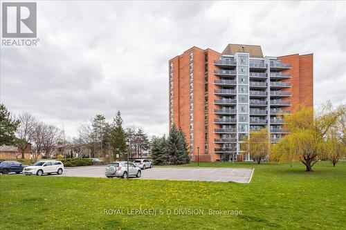 404 - 2665 Windwood Drive, Mississauga, ON - Outdoor With Balcony With Facade