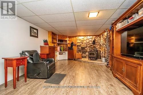 1183 Heights Rd N, Kawartha Lakes, ON - Indoor Photo Showing Other Room With Fireplace