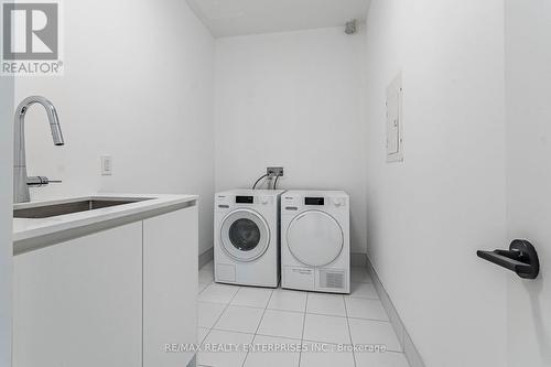 #202 -55 Port St E, Mississauga, ON - Indoor Photo Showing Laundry Room