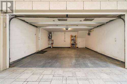 #Th01 -761 Bay St, Toronto, ON - Indoor Photo Showing Garage