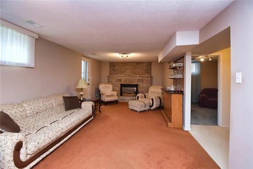37 Anthony Street, Hamilton, ON - Indoor Photo Showing Living Room With Fireplace