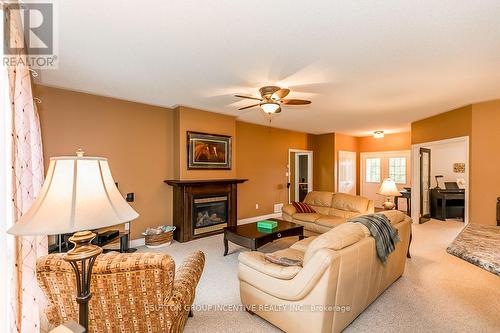 80 O'Neill Circle, Springwater, ON - Indoor Photo Showing Living Room With Fireplace
