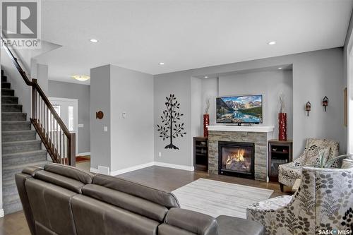 5285 Aviator Crescent, Regina, SK - Indoor Photo Showing Living Room With Fireplace