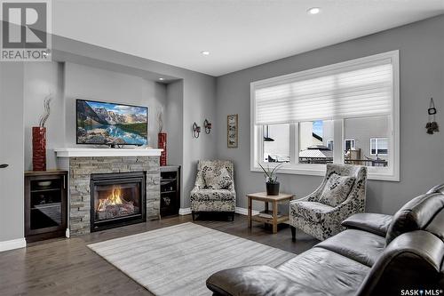 5285 Aviator Crescent, Regina, SK - Indoor Photo Showing Living Room With Fireplace