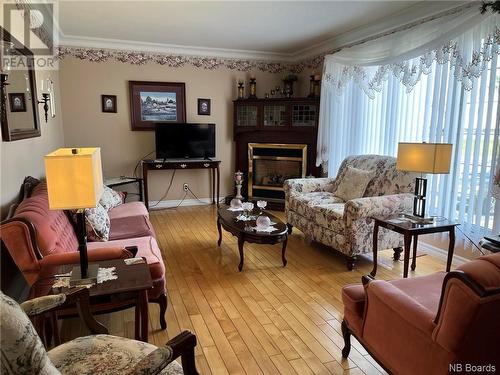 122 Tardy Avenue, Miramichi, NB - Indoor Photo Showing Living Room With Fireplace