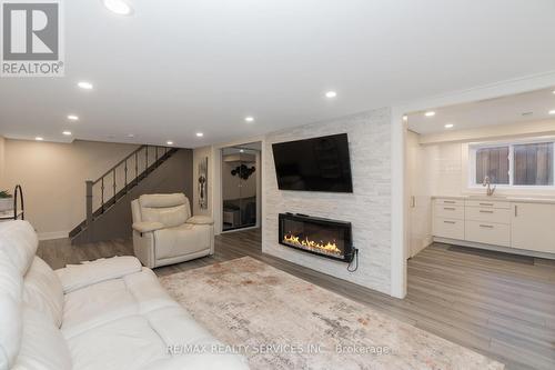 8 Garfield Cres, Brampton, ON - Indoor Photo Showing Living Room With Fireplace