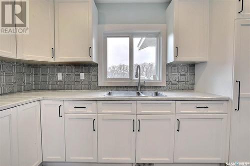 Martin Acreage, Aylesbury, SK - Indoor Photo Showing Kitchen With Double Sink