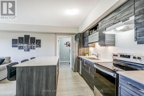 #305 -10 Culinary Lane, Barrie, ON - Indoor Photo Showing Kitchen With Double Sink With Upgraded Kitchen