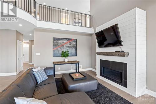 556 Shoreway Drive, Ottawa, ON - Indoor Photo Showing Living Room With Fireplace