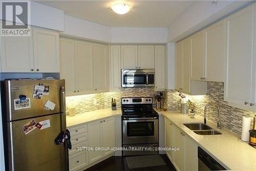 405 - 24 Woodstream Boulevard, Vaughan, ON - Indoor Photo Showing Kitchen With Double Sink