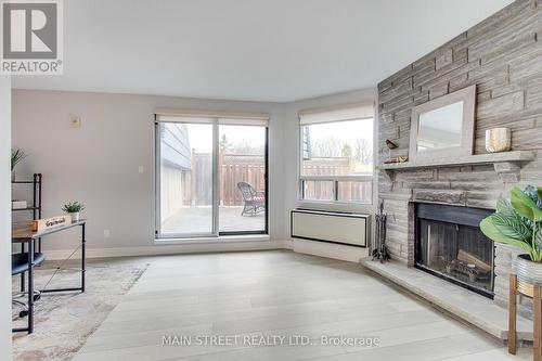 #316 -155 Main St N, Newmarket, ON - Indoor Photo Showing Other Room With Fireplace