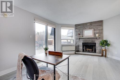 #316 -155 Main St N, Newmarket, ON - Indoor Photo Showing Living Room With Fireplace