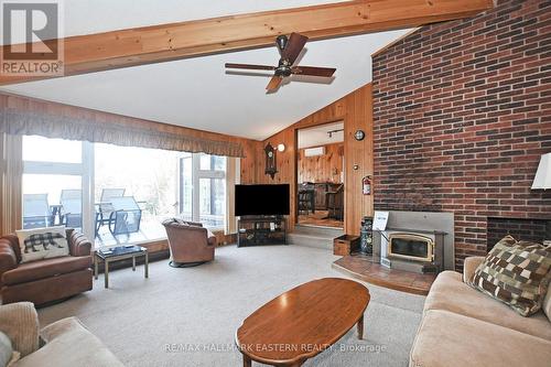 326 Indian Point Road, Kawartha Lakes (Coboconk), ON - Indoor Photo Showing Living Room With Fireplace