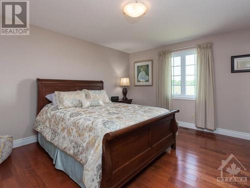 Primary bedroom with walk in closet & 3pc ensuite - 574 Highway 15 Highway S, Lombardy, ON 